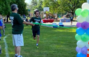 Runner finishing the Jurassic 5K Walk/Run