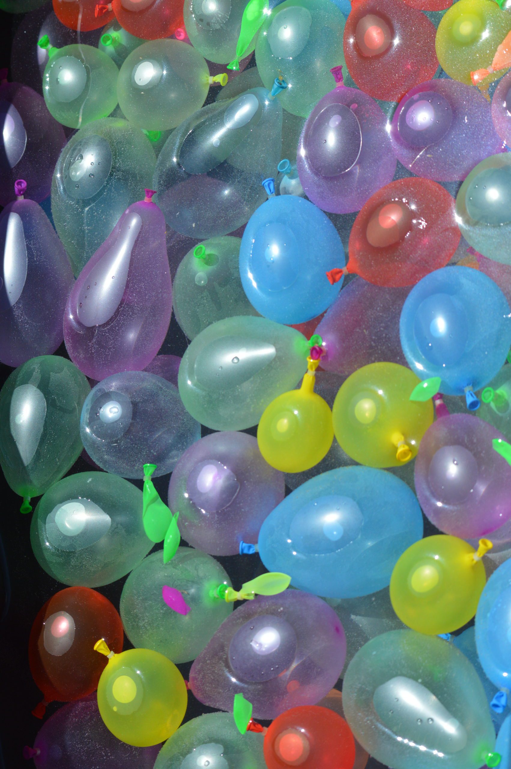Water balloons in a tub of water