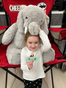 A student with Veda the stuffed elephant at Hannaford in East Greenbush