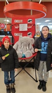 Students with Veda the stuffed elephant at Hannaford in East Greenbush
