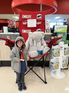 A student with Veda the stuffed elephant at Hannaford in East Greenbush