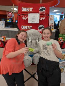 Students with Veda the stuffed elephant at Hannaford in East Greenbush