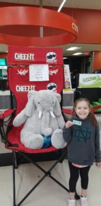 A student with Veda the stuffed elephant at Hannaford in East Greenbush