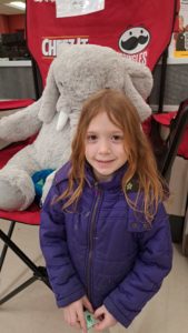 A student with Veda the stuffed elephant at Hannaford in East Greenbush