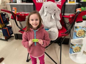 A student with Veda the stuffed elephant at Hannaford in East Greenbush