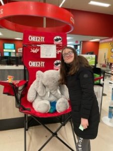 A student with Veda the stuffed elephant at Hannaford in East Greenbush
