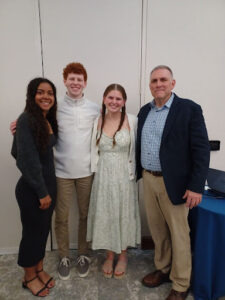 Alivia Landy, Evan Rainville, Sarah Rainville, and Dr. Shay Harrison at the News Channel 13 Basketball All Star Dinner