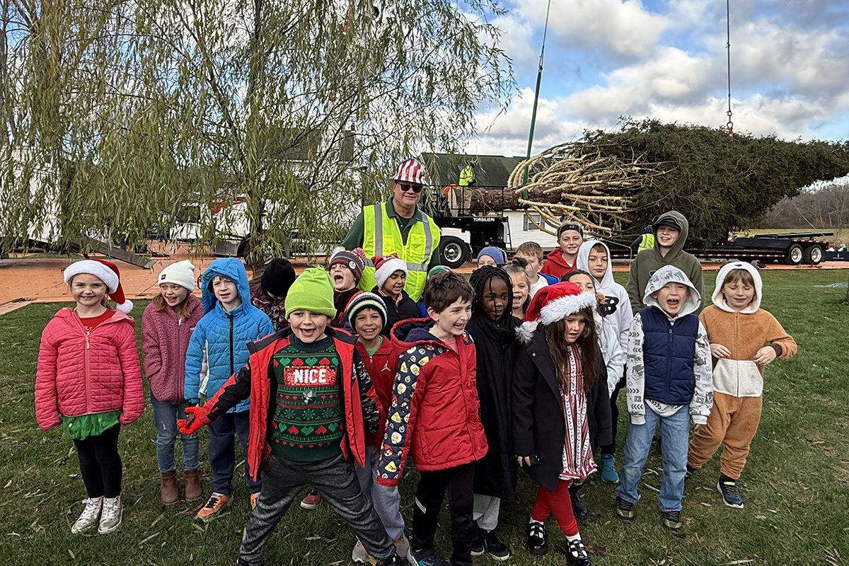 Mrs. Slater's class in front of the 2025 Rockefeller Center Christmas Tree